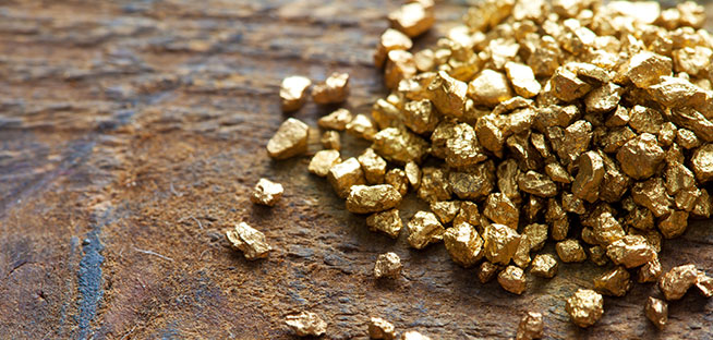 gold nuggets on table