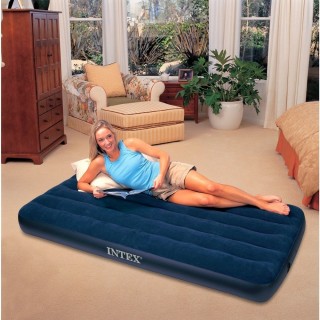 woman on air mattress by Intex